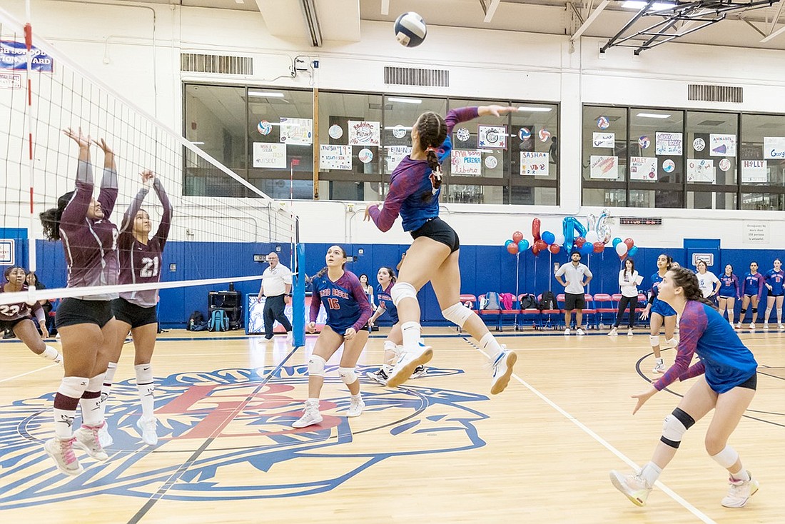 Junior outside hitter Oriah Rosenfeld attacks the ball in Blind Brook’s homecoming game against Valhalla on Saturday, Sept. 28. It would be the Trojans’ only loss of the season.