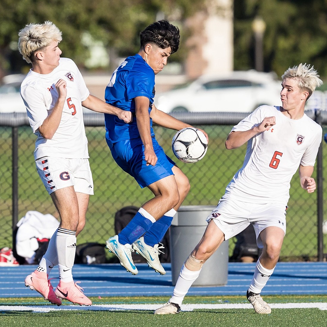 Senior striker Bertrand Moreau fights for the ball in Port Chester’s Monday, Oct. 7 home tie with Horace Greeley.