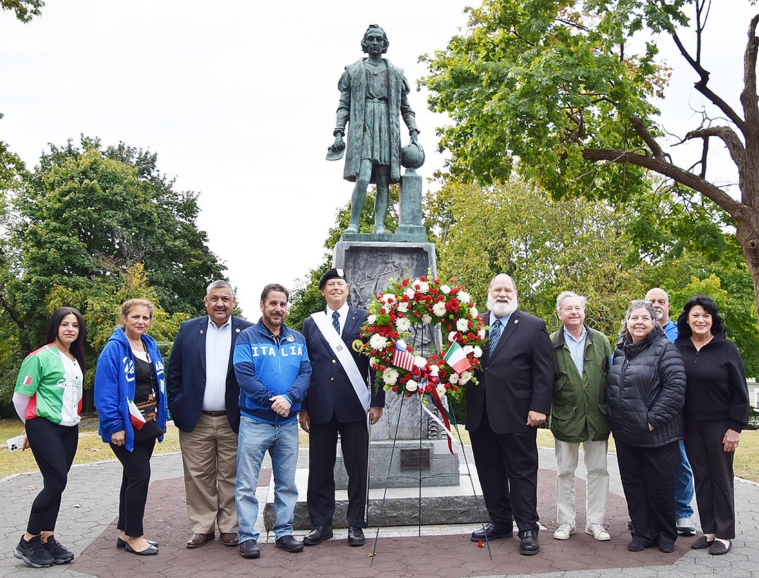 Local officials and members of the Columbus Day Observance Committee gather at the statue of Christopher Columbus up on a hill at Columbus Park off Ryan Avenue on the morning of Sunday, Oct. 13 to commemorate Columbus’s arrival in the Americas on Oct. 12, 1492 with a beautiful memorial wreath. They are, from left, Trisha Gianfransico, Debbie Scocchera, Mayor Luis Marino, Deputy Mayor Phil Dorazio, Chet Edwards, Charlie Sacco, Assemblyman Steve Otis, Toni Sacco, Mark Scocchera and Hope Vespia.