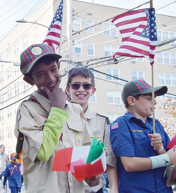 After rushing to get ahead of his friends, Rye Brook Cub Scout Andrew Joseph (left) flashes a quick pose for the camera.