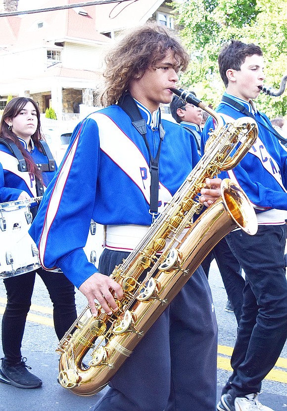 Port Chester Middle School eighth-grader Riley Darling, 13, plays the baritone saxophone with the school band.