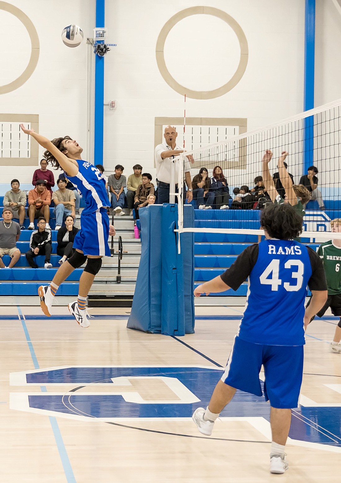 Nicholas Wolff jumps super high to return a ball in the Rams’ Sept. 27 volleyball game against Brewster.