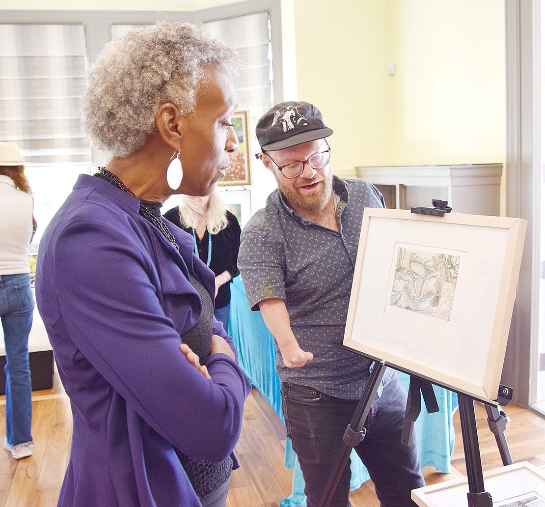 Port Chester resident artists Brenda Mattavous and Michael Angelis talk shop during the Port Chester Council for the Arts’ 13th annual ART10573 exhibit and sale on Sunday, Oct. 20. A record-high 23 artists brought their work to the Crawford Mansion Community Center that day.