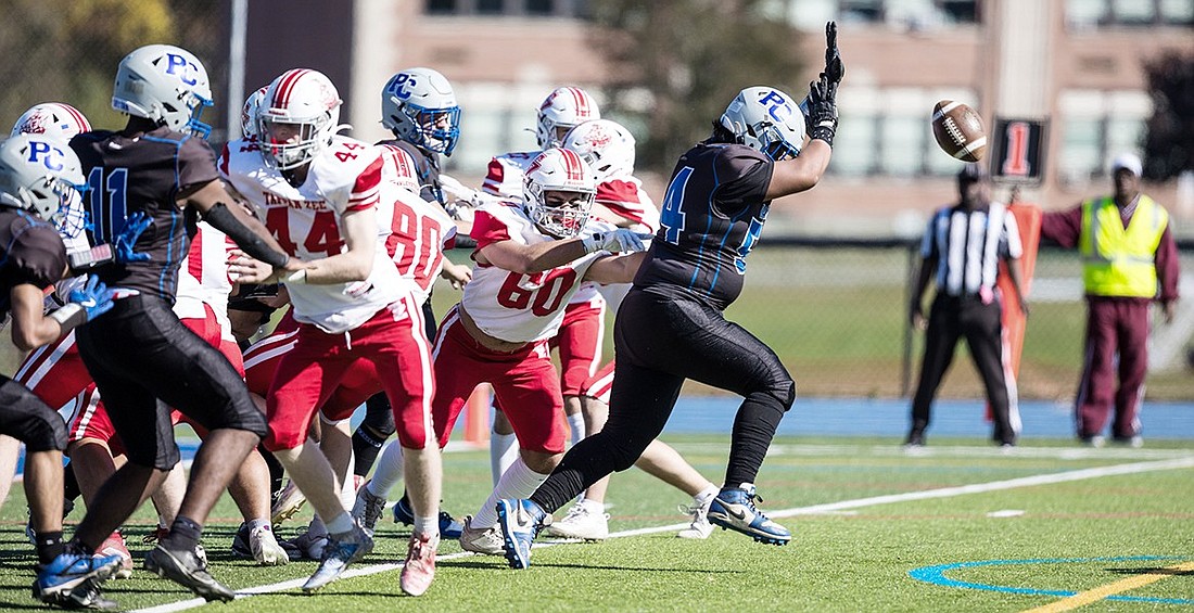 Captain Alber Poroj blocks the extra point after a touchdown in Port Chester’s Saturday, Oct. 19 loss to Tappan Zee.