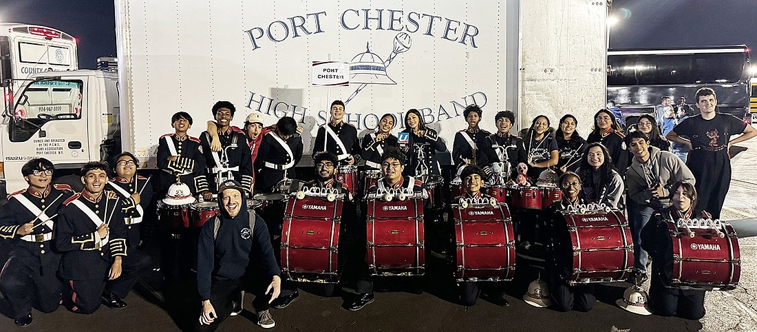 The percussion section of the Port Chester High School Marching Band gathers for a celebratory photo after winning the Best Percussion award at the Ludwig-Musser Classic at MetLife Stadium on Oct. 12.