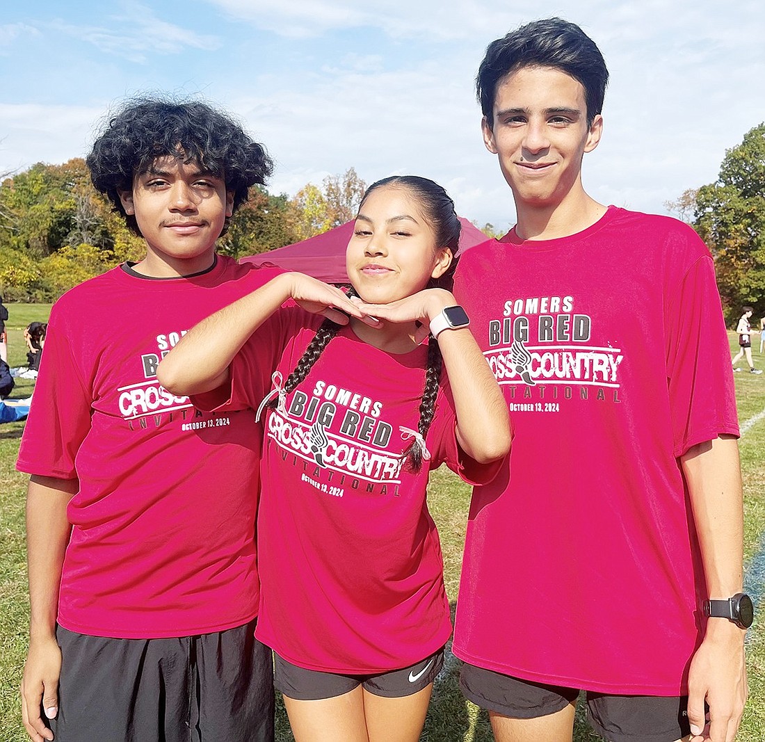 Andy Jiminez (left), Alexa Aguiriano and Santiago Marquez did themselves and Port Chester proud and got a red shirt for their efforts in their respective races at the Somers Big Red Invitational on Sunday, Oct. 13.