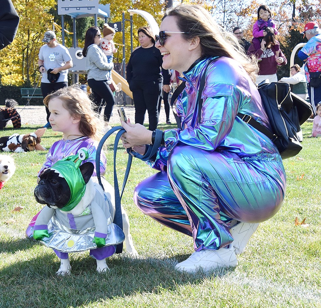 Patiently waiting for the ratings to come in, Ashley Gonzalez, her 3-year-old daughter Dahlia and 5-year-old French Bulldog Presidente are happy to earn second-place recognition. The Martians are visiting from their home in White Plains.