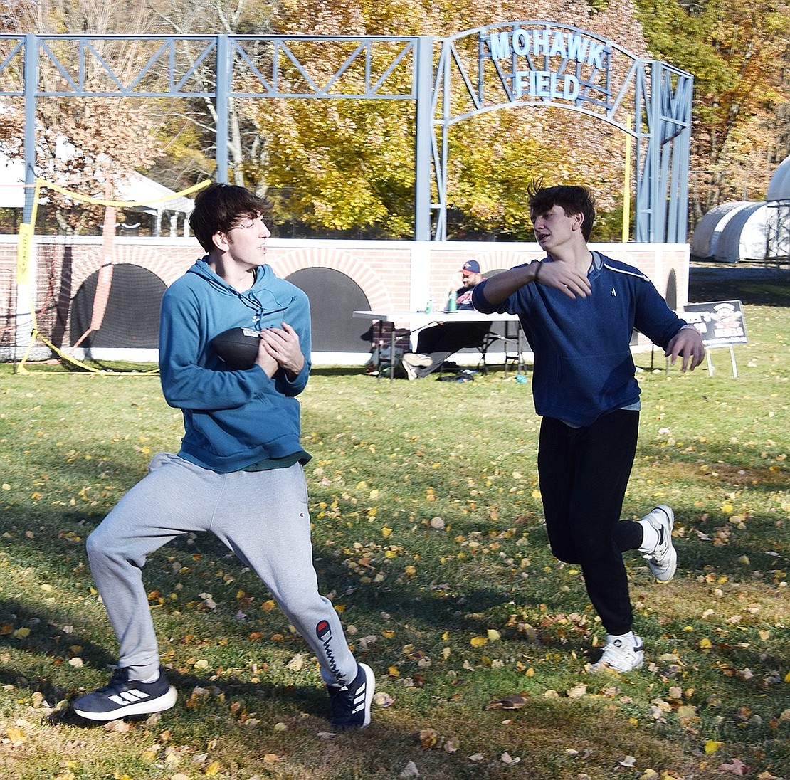 Blind Brook High School sophomore Luke Scinto, 15, beats out junior Jake Radwaner, 16, for the catch while running some football routes on one of the fields.