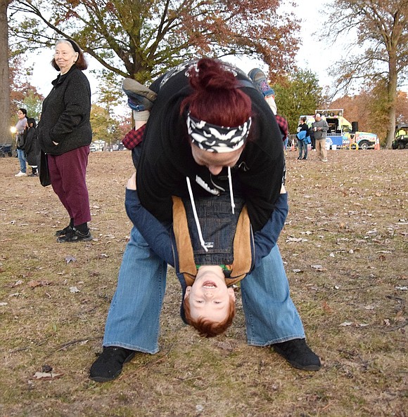 Though Hunter Conboy, 3, is dressed as Chucky the menacing doll, he doesn’t seem so scary while playing with his mother Ashley Beadle. Beadle, a resident of Greenwich, Conn., was raised in Port Chester.