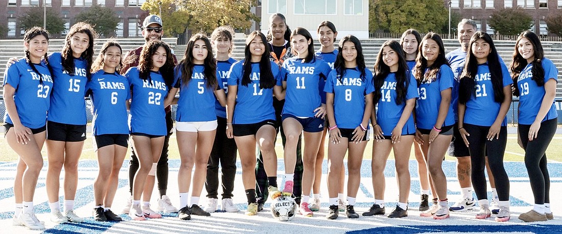 The 2024 Port Chester Lady Rams soccer team which finished with an 8-8 record, far surpassing last year’s 3-12 standing. They are Leidy Emily Estrada Juarez, Mariana Torres, Leslie Reyes, Saidy Hernandez, Kimberly Flores, Juliana Castillo, captain Bridget Morocho, captain Gioiella Pastena, Valeria Torres, Aracely Sanchez, Melani Lopez, Erika Barzallo, Alison Lopez. Unnamed are two girls in the back whose jersey numbers are hidden. Coaches are Danny Alvarado (head coach, at right), Jonathan Garces and Cecilia Martinez.