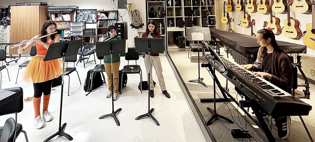 Blind Brook High School senior flautist Rachel Horn (left), junior flautist Lianne Ferentz, junior oboist Jocelyn Zheng and junior pianist Abigail Weintraub rehearse for their concert as part of the Westchester Chamber Music Society on Sunday, Nov. 10 at Congregation Emanu-El of Westchester in Rye.