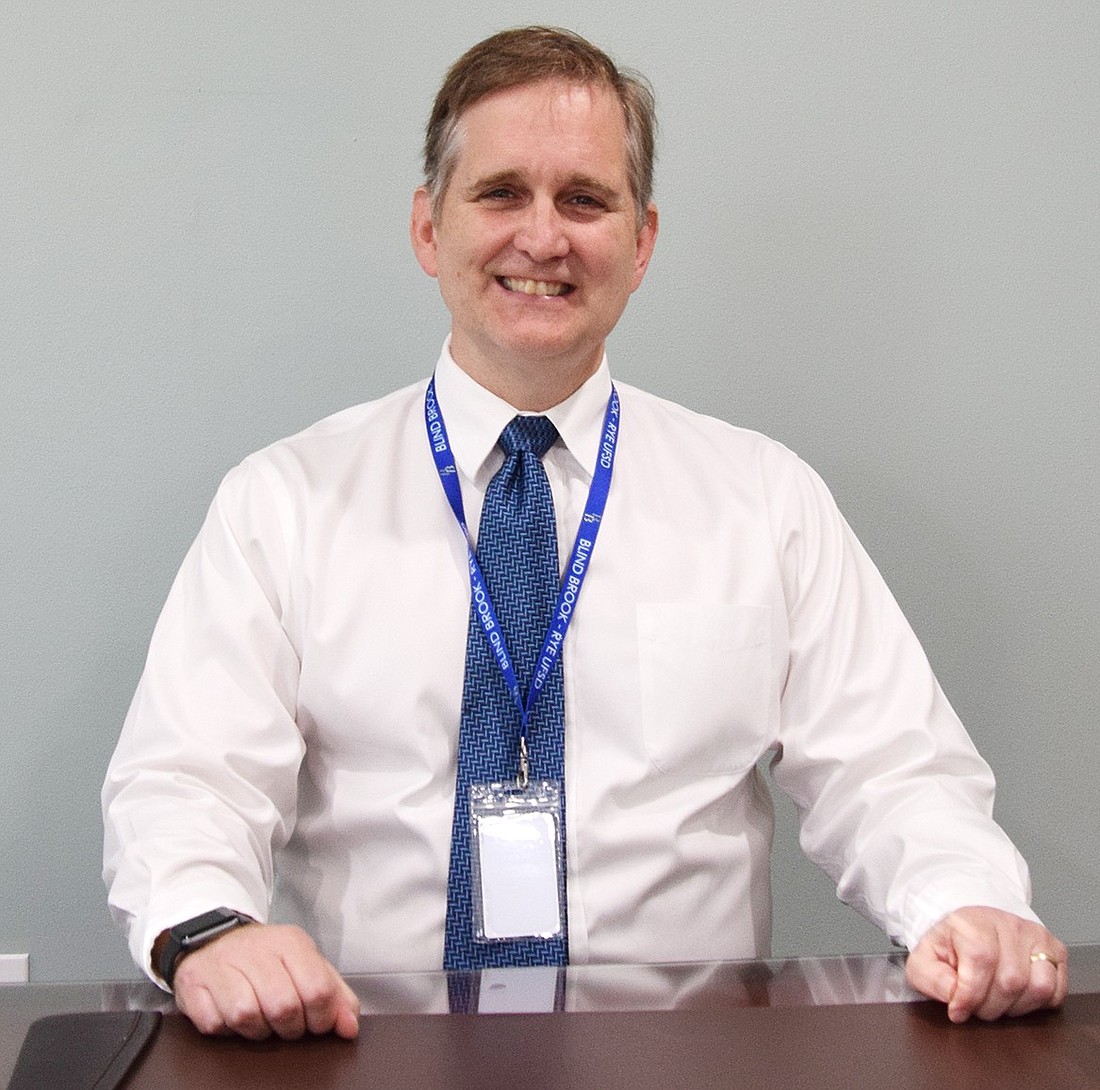 Blind Brook Superintendent Dr. Colin Byrne poses for a photo at his desk in the administration building on Wednesday, Nov. 6. Earlier this week, he announced to the community that he will be retiring on June 30, 2025, after what will be a 22-year career in the district.