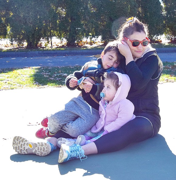 Rye Brook resident Amy Rettner watches the drops with her 5-year-old son Benji and 17-month-old daughter Madeline.