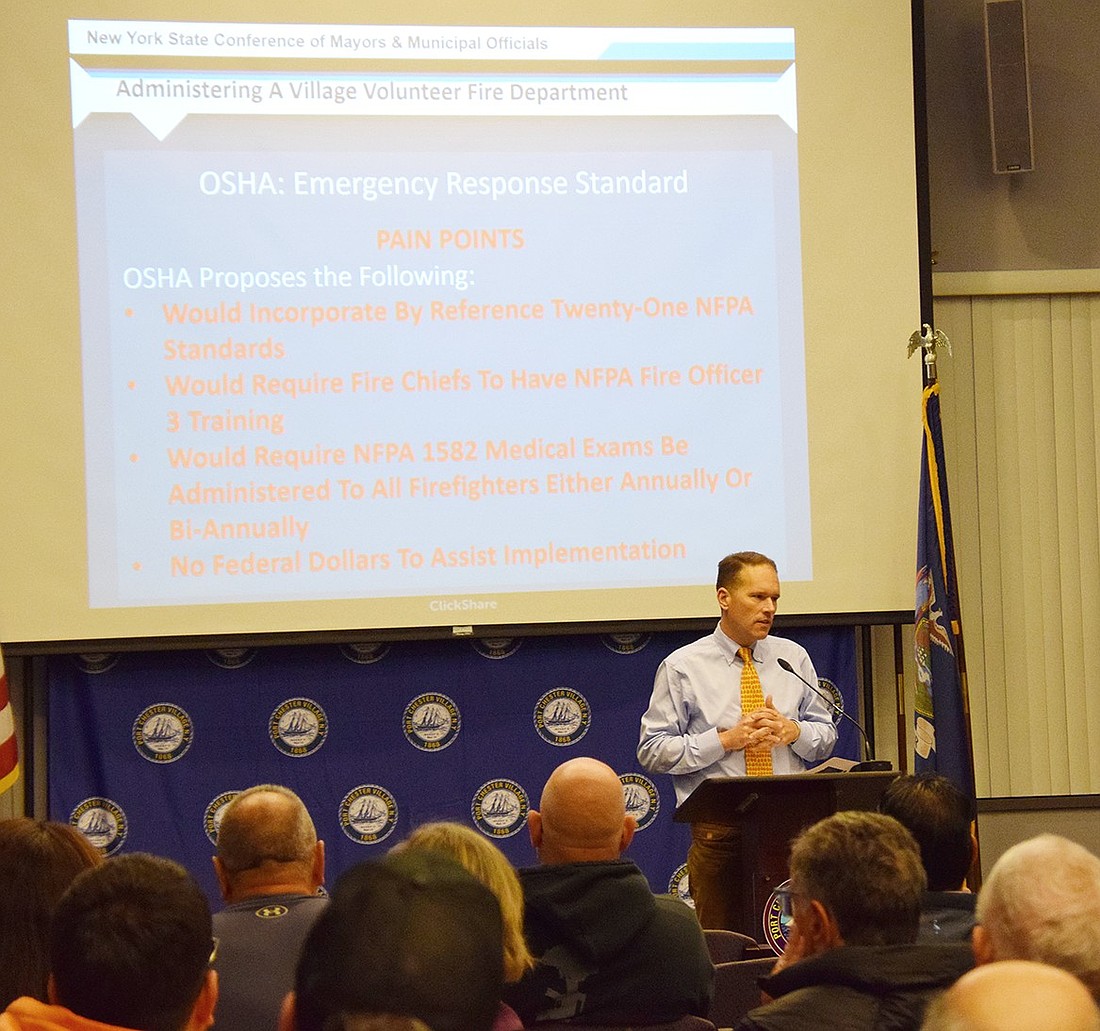 New York Conference of Mayors Counsel John Mancini addresses attendees during the Port Chester Village Manager’s Speaker Series at the Port Chester Senior Community Center on Oct. 29. He led a discussion on the operation of village volunteer fire departments.