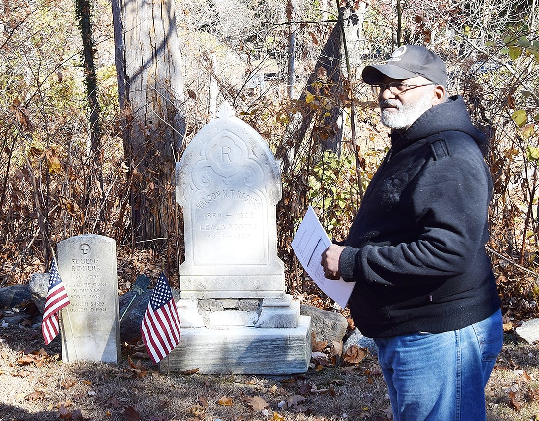 Port Chester resident Dave Thomas, founder of the Friends of the African American Cemetery, speaks in front of the headstones of World War I veteran Eugene Rogers and his father Valson during the Veterans Day ceremony at the African American Cemetery in Rye on Saturday, Nov. 9.