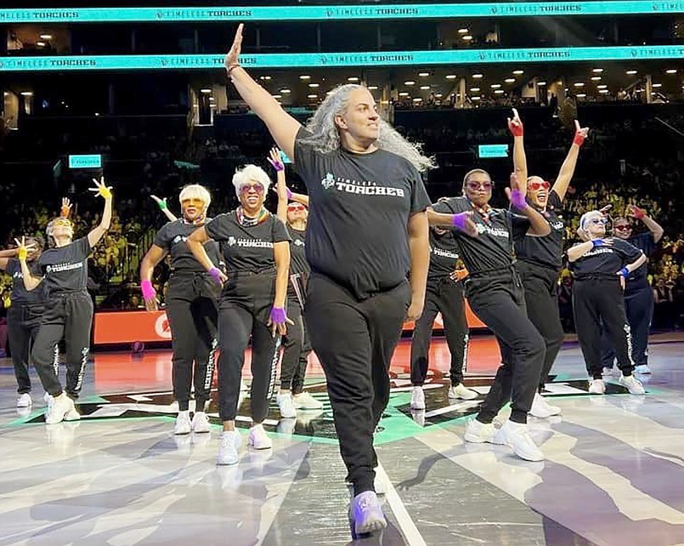 Port Chester High School's head cheerleading coach John Gonzalez leads the New York Liberty's senior dance team strutting their stuff while keeping the sold-out crowd cheering on the Libs to their first Women's National Basketball Association Championship in 27 years at Barclays Center in Brooklyn in late October. The Libs beat the Minnesota Lynx in overtime in a winner-take-all pivotal fifth game—the first ever to go into OT.