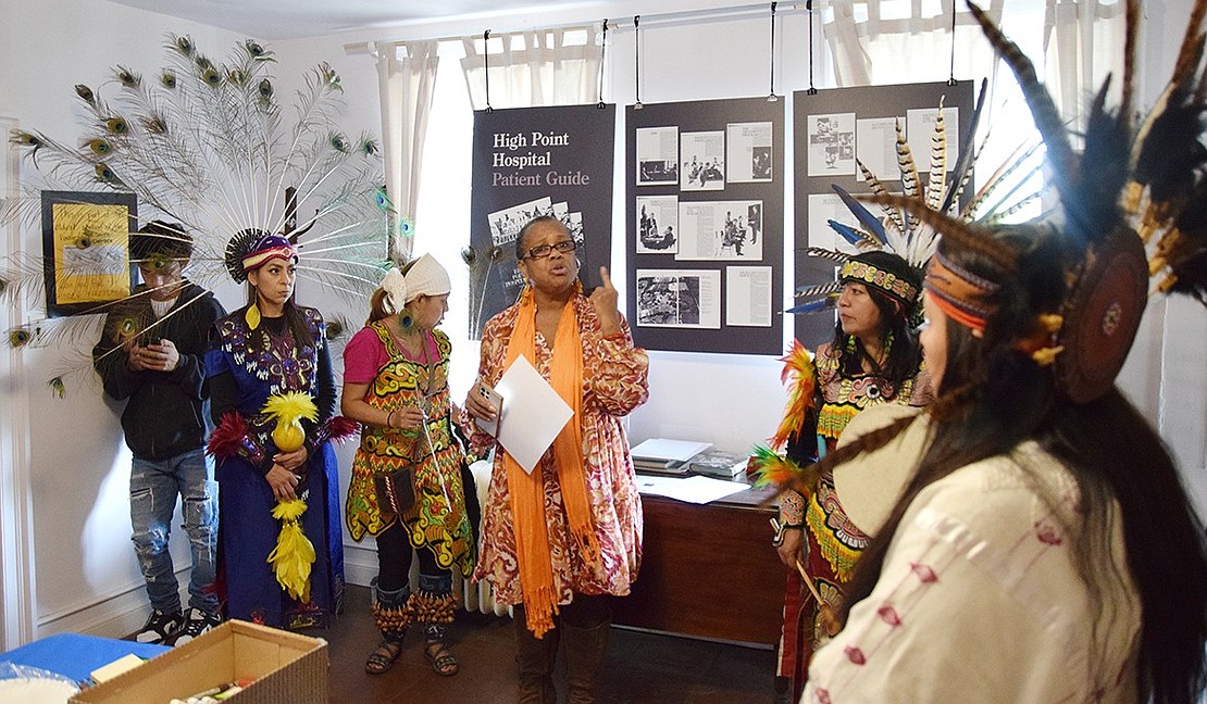 Flanked by the traditional Aztec dancers of La Santa Cruz Del Caminante, Port Chester Trustee Joan Grangenois-Thomas speaks on the importance of recognizing and appreciating indigenous cultures.