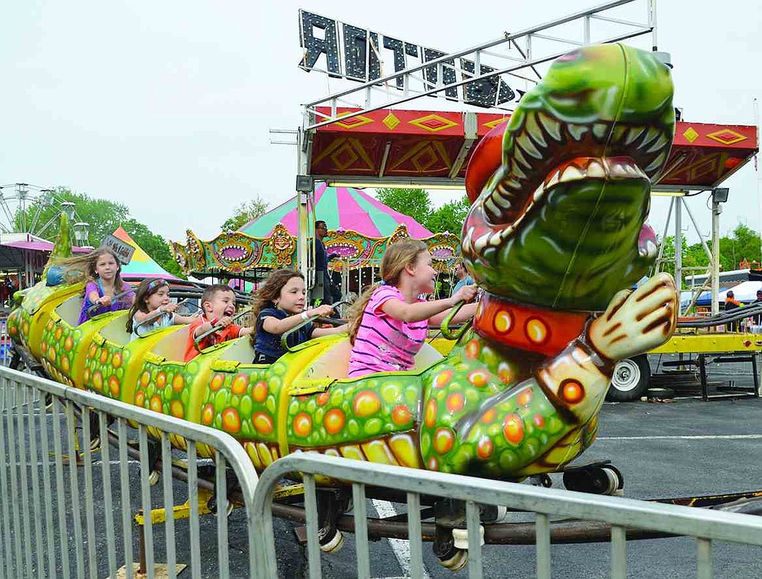  Children fill every car on the Go-Gator roller coaster.  