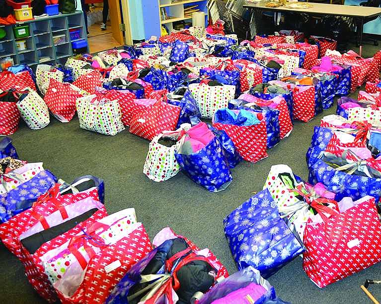  The collected coats, donated by families in Rye, Purchase, Harrison and Greenwich, Conn., filled up two classrooms at The Carver Center. Some coats were sent from as far as Texas and Florida.