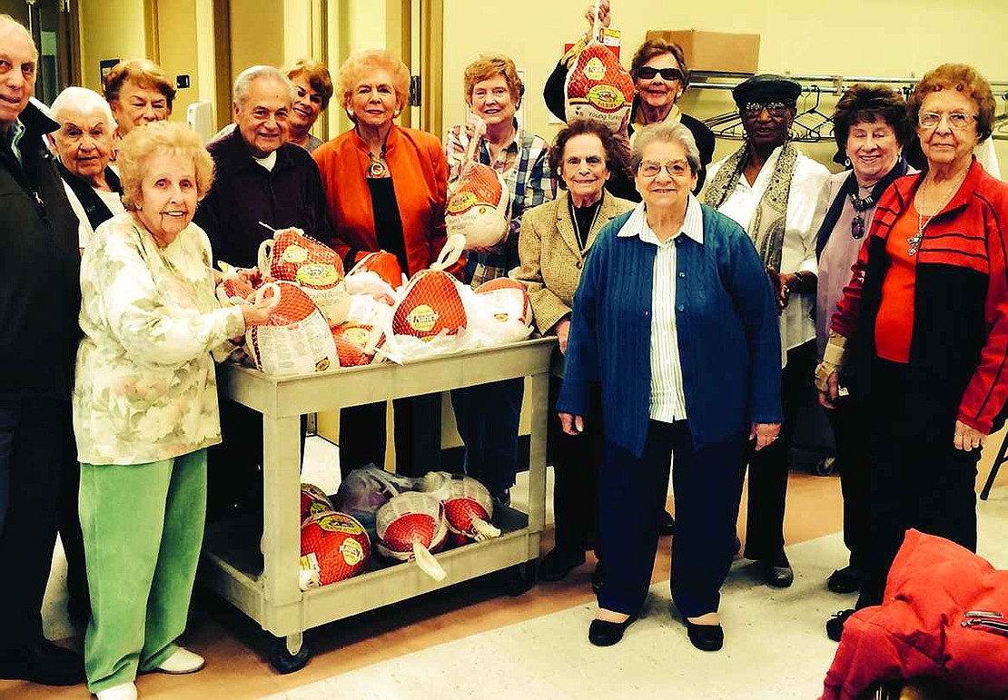  Members of the Rye Brook Seniors donated 20 large turkeys to St. Peter's Episcopal Church for families in need. One senior said as a child she was on welfare and appreciated the help and wanted to assist others. From left: Clem Patafio, Bernice Martino, Marion Aicher, Joe Pavone, Nancy Weinberger, Jean Apuzzo, Barbara Nardi, Lucille Porto, Gloria Orzo, Anna Amaturro, Dorothy Anderson, Vivian Langworth and Jean Mendicino. 