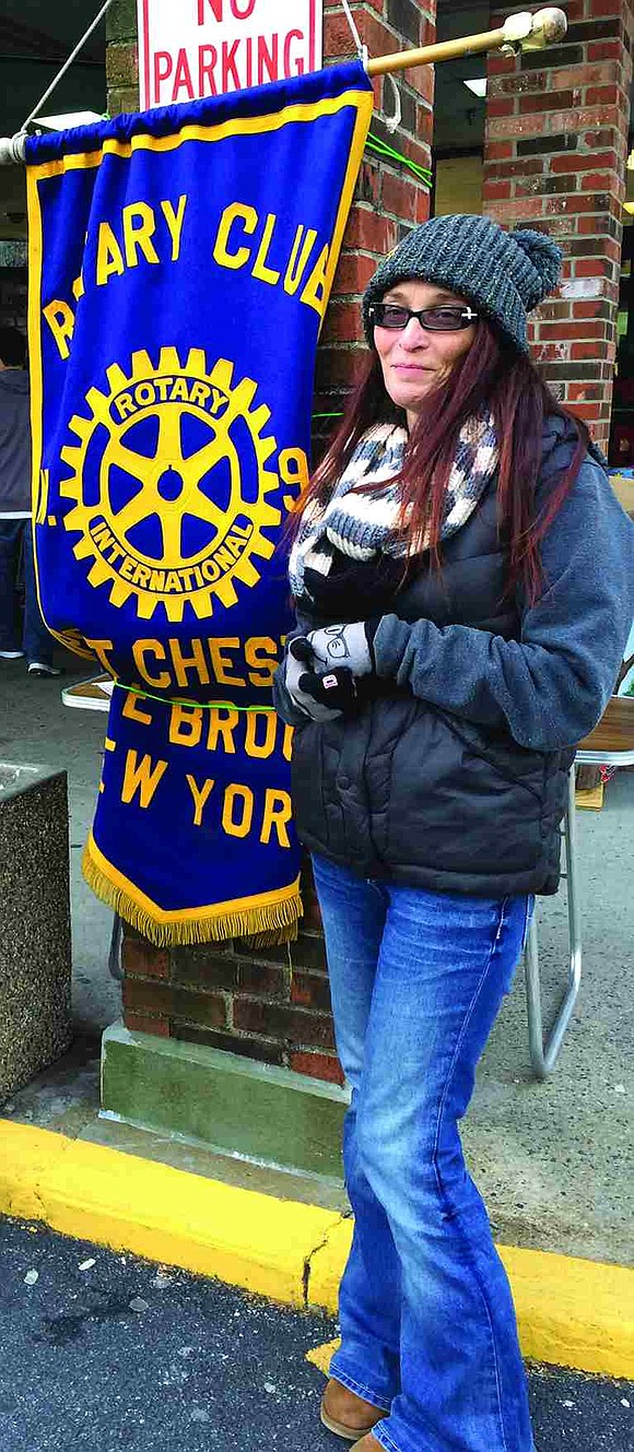  Anna Kobelka of Ossining, secretary of the Port Chester/Rye Brook Rotary Club, stands in front of A&P Fresh in Rye Brook. Anna works in Port Chester. 