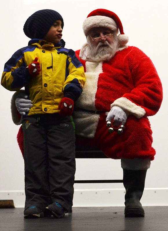 Port Chester children gather at Lyon Park on Thursday, Dec. 11 to meet Santa.