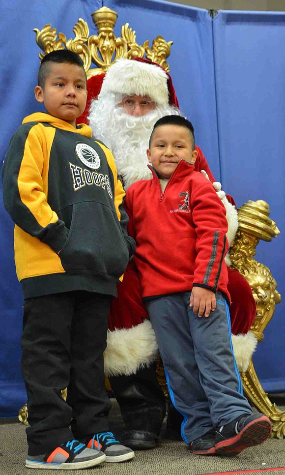Don Bosco Center hosted breakfast and a present giveaway from Santa on Saturday, Dec. 20.
