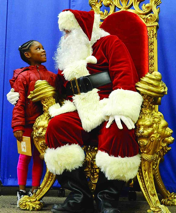 Six-year-old Dynasti O'Neil of Weber Drive tells Santa what she wants for Christmas. 