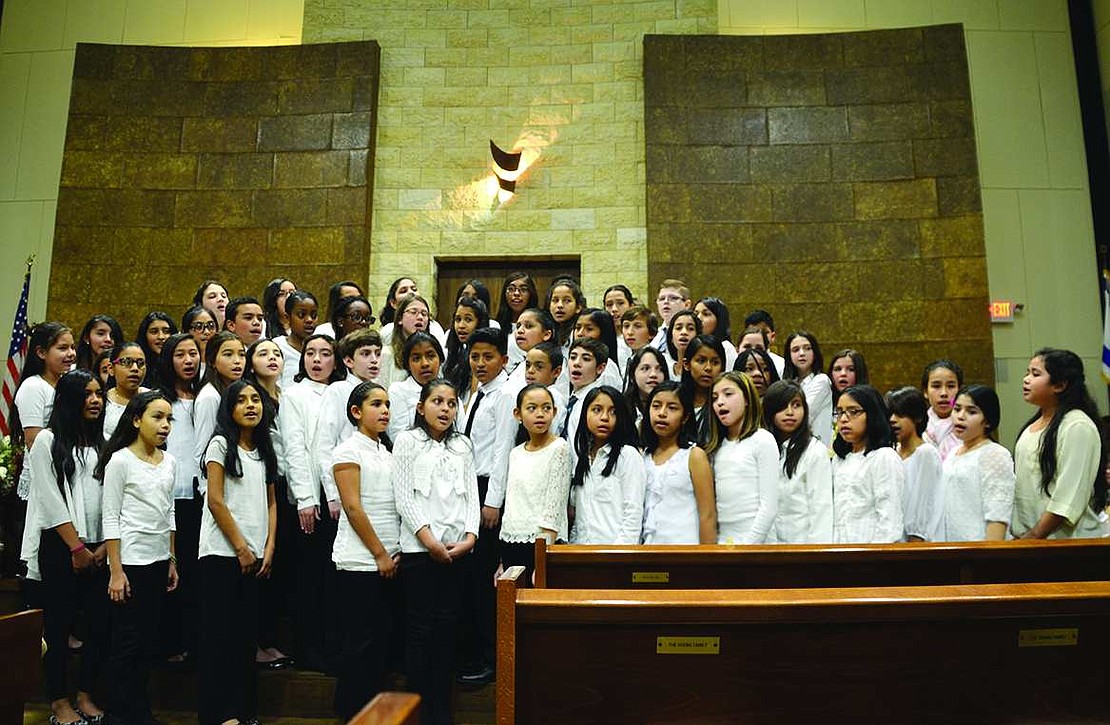 The Port Chester Middle School 6th Grade Chorus sings "Build Me A World." 