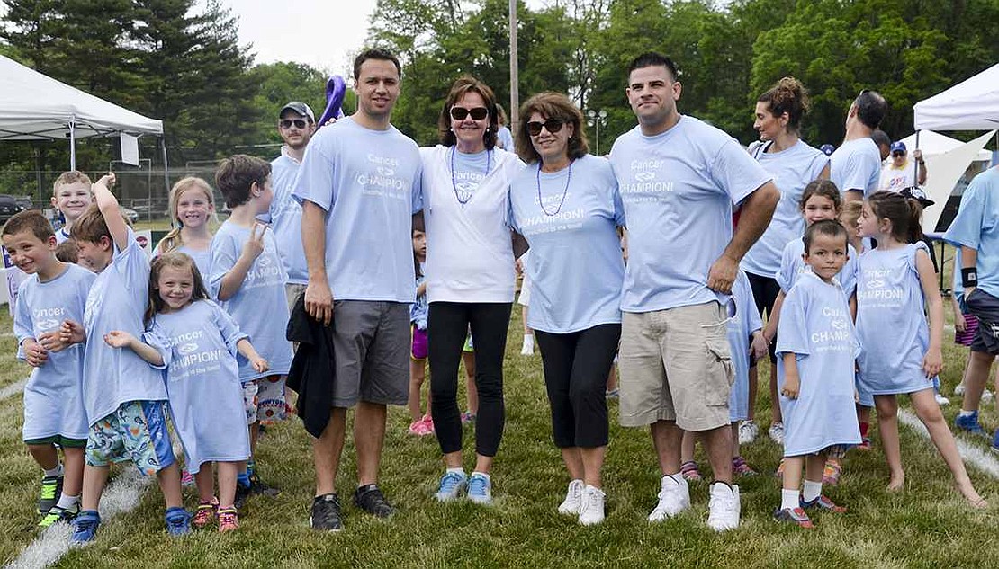 A stormy afternoon brought the fun to an early end, but the third annual Port Chester-Rye Brook Relay for Life still involved speeches, fundraising activities and community spirit at Port Chester Middle School on Sunday, May 31.  