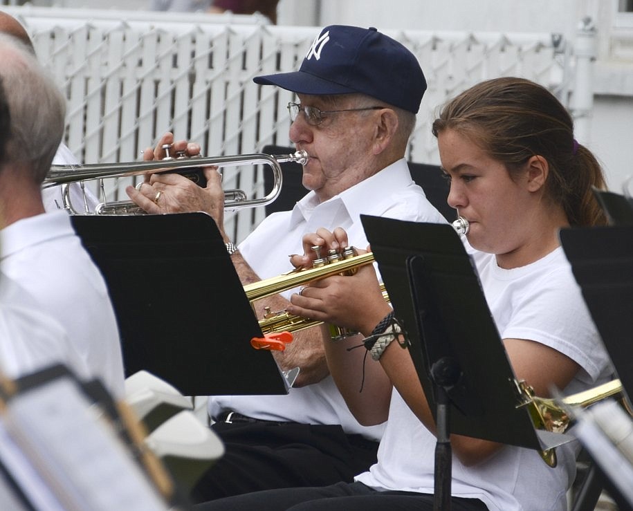 Members of the Rye Town Community Band play a rendition of "Yesterday" by John Lennon and Paul McCartney. 