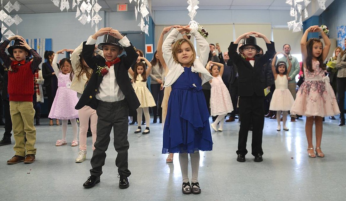 The Ridge Street School first graders danced up a snowstorm at the 28th annual Snowball on Friday, Jan. 22 for the students in Linda Greco's and Keri Fischer's classes. Another Snowball for the other first grade classes took place the day before.