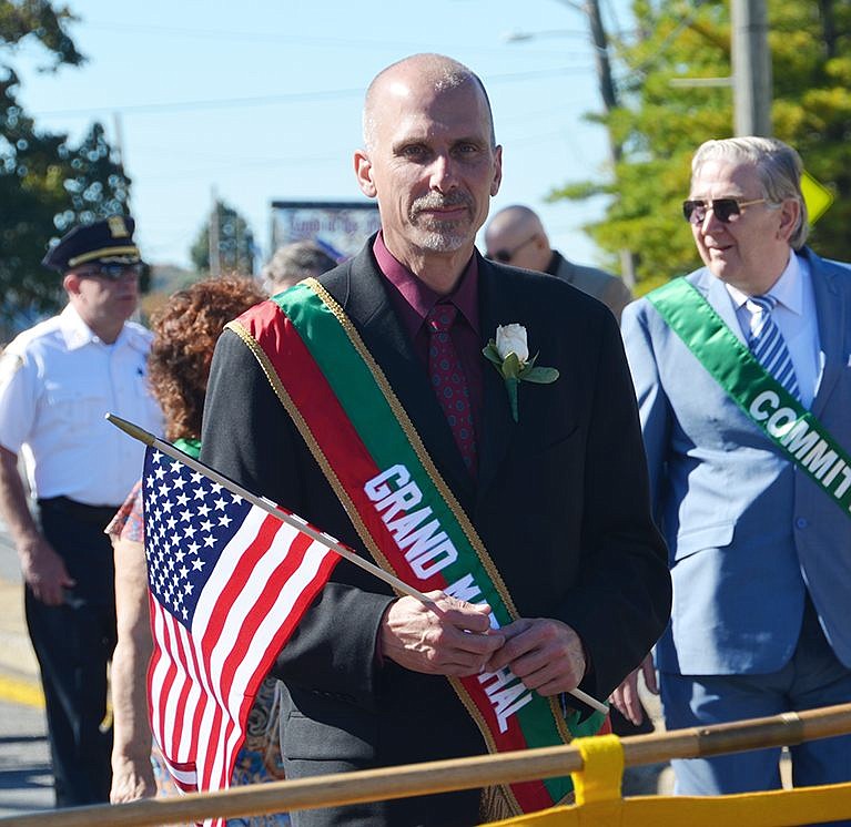 As the grand marshall, Scott Moore, the administrator of the Port Chester-Rye-Rye Brook EMS, leads the parade.