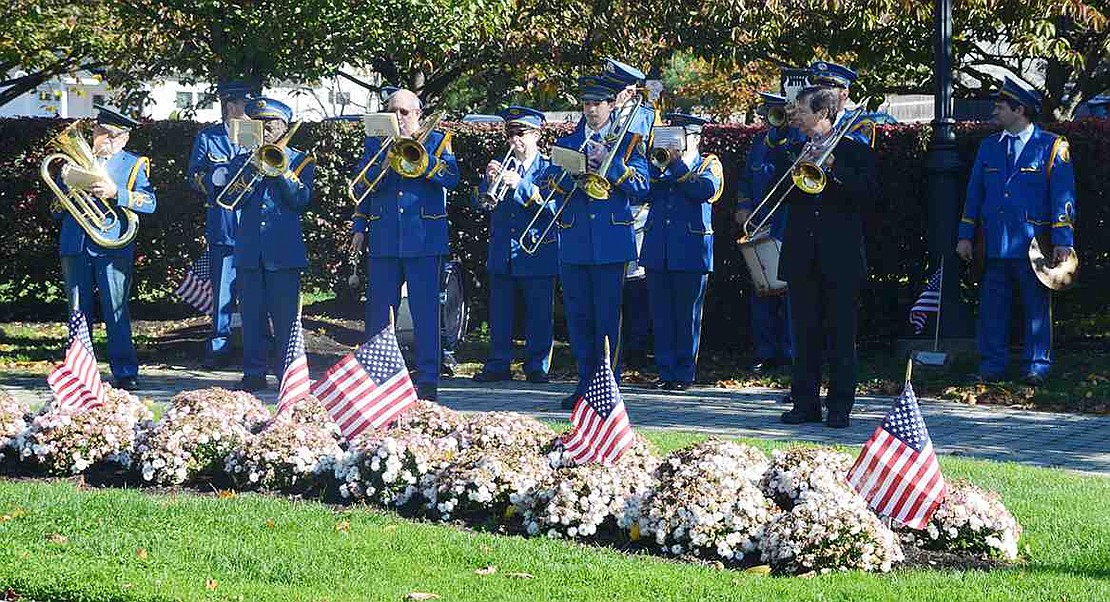  The Port Chester American Legion Band plays the National Anthem.