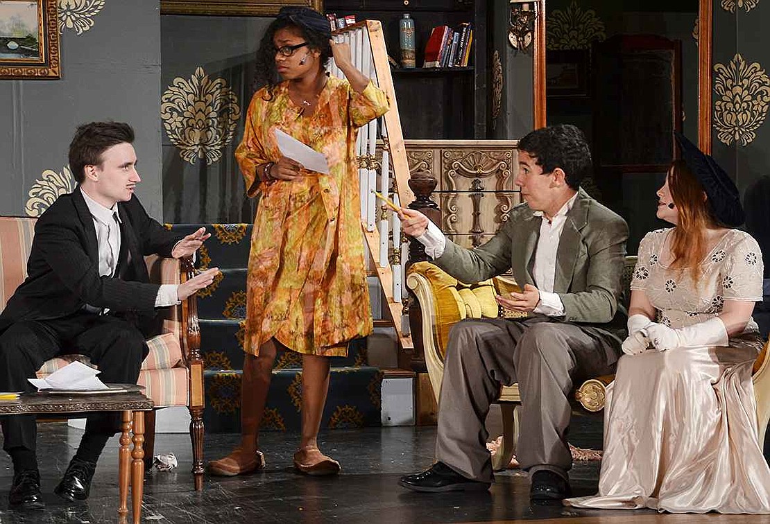 Tony Kirby tries to calm down his father during a game organized by his fianc&#233;e's mother, Penelope Sycamore. From left: Port Chester High Schools' Liam Herbert, Briana Velazquez, Robert Mickatavage and Grace Herbert in You Can't Take It with You.