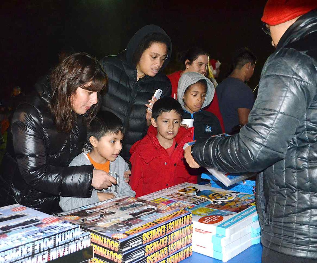  Children-with the help of their parents-get to pick out one present to bring home with them.  