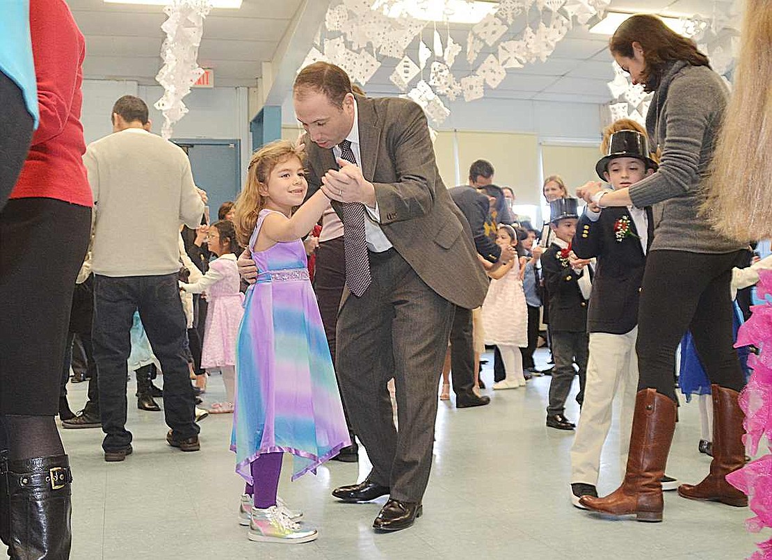 Andrew Hodes shares an "Unforgettable" dance with his daughter Carly.