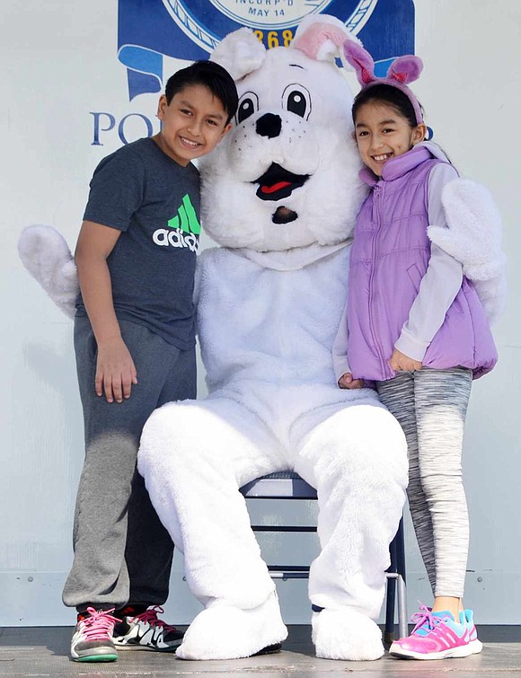 <p class="Picture">Port Chester siblings Gabriel Maurad, 11, and Melanie Maurad, 9, pose with the bunny at the annual Easter in the Park event at Lyon Park on Saturday, Mar. 12. It was sponsored by the Port Chester Recreation Department.</p>