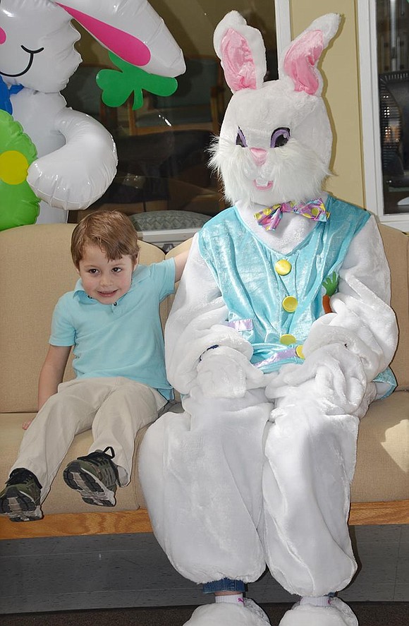 <p class="Picture">Luke Pallotta, 4, of King Street sits awkwardly with the Easter Bunny. A very stiff Alice Jensen played the part.</p>