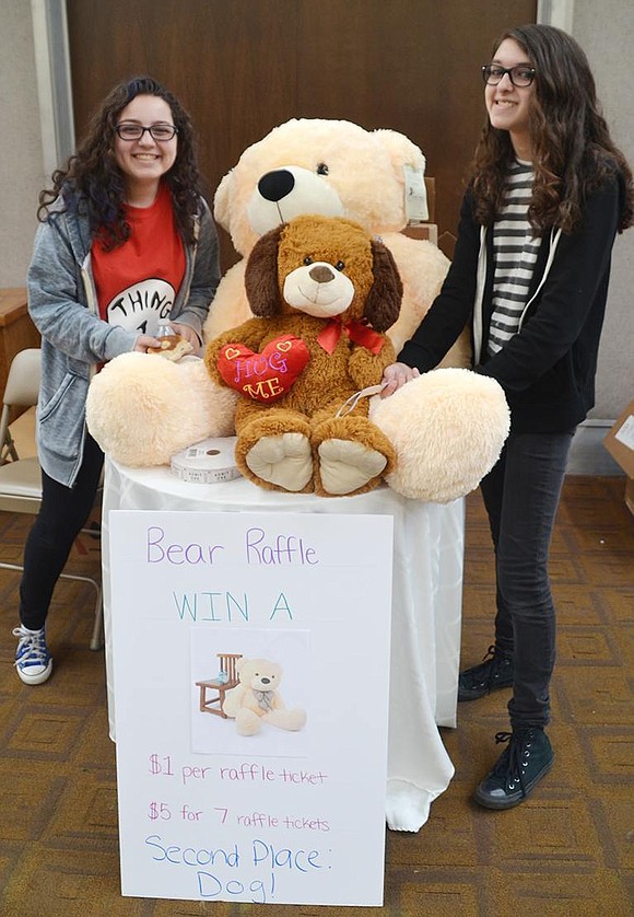 <p class="Picture">Adena Kibel, 14, of The Arbors and Rena Zisser, 13, of White Plains man the Bear Raffle booth.</p>