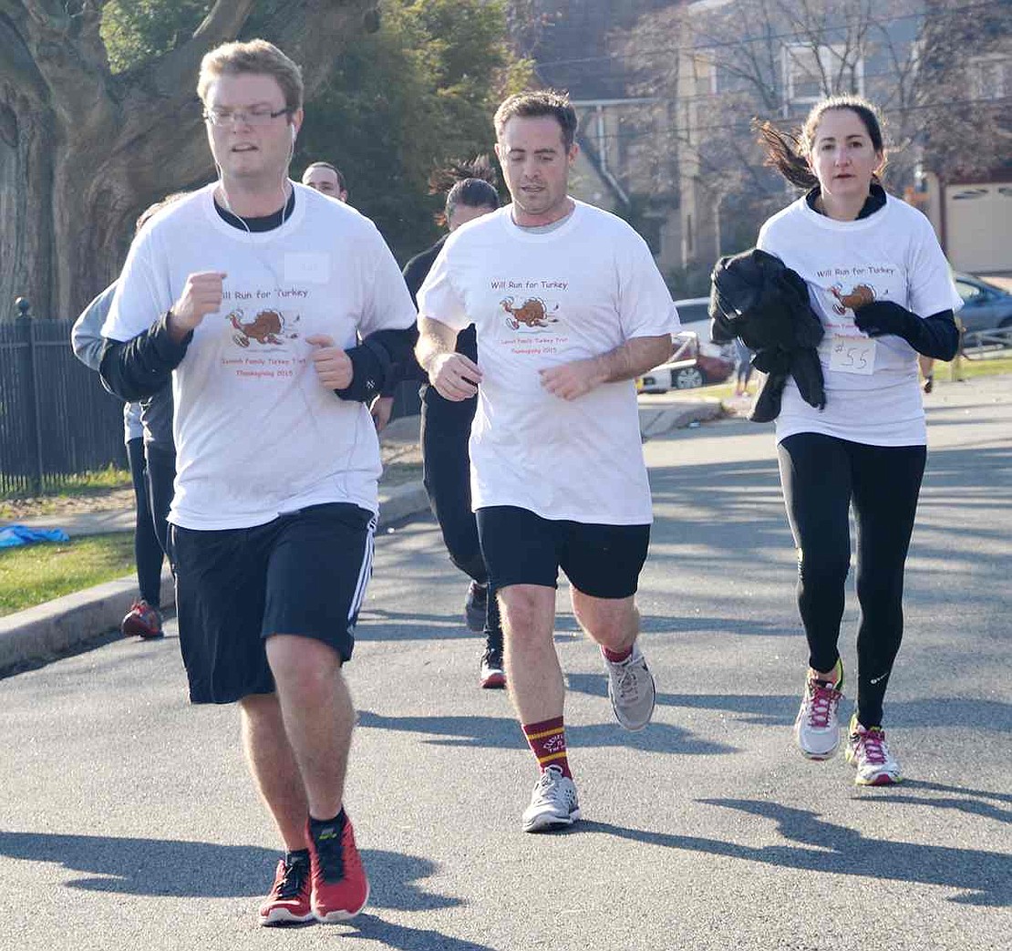  The Lumish family of Rye Brook wear original Turkey Trot T-shirts.  