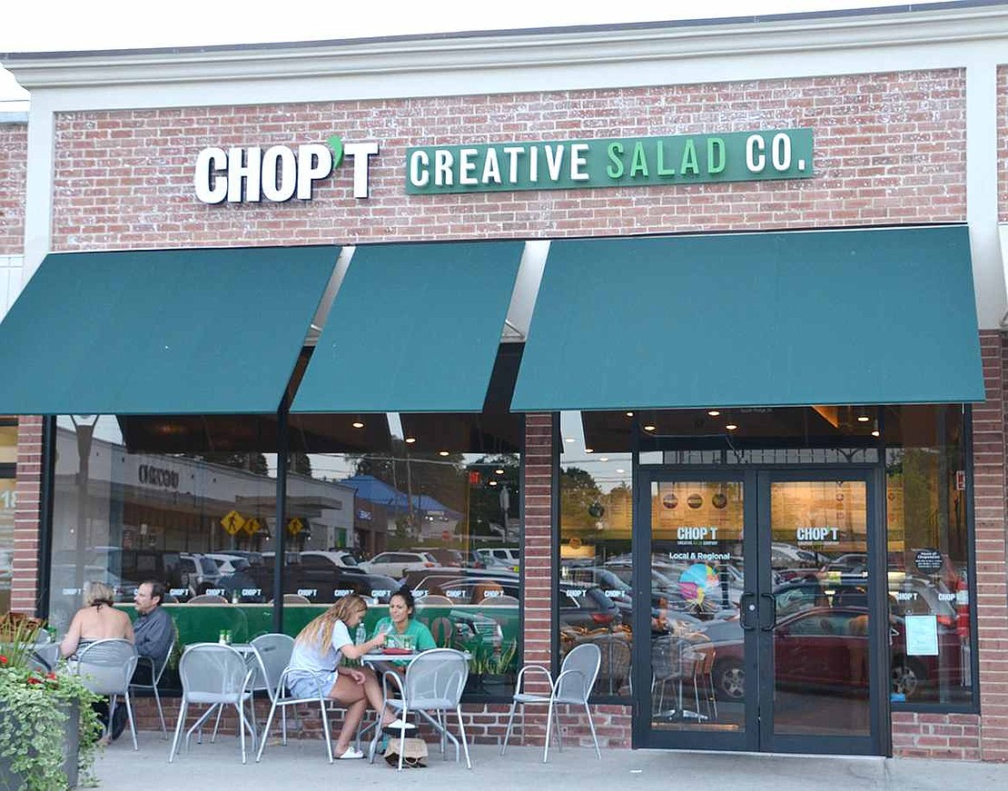  Tables set up in front of Chop't Creative Salad Co.