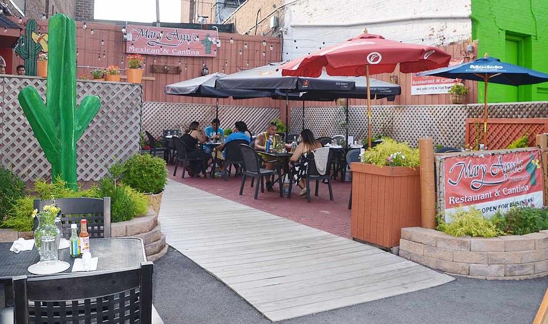  The spruced up patio featuring a large cactus at Mary Ann's Mexican Restaurant