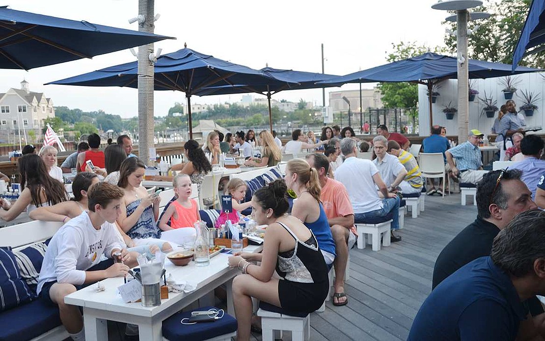  Crowded deck overlooking the Byram River at bartaco