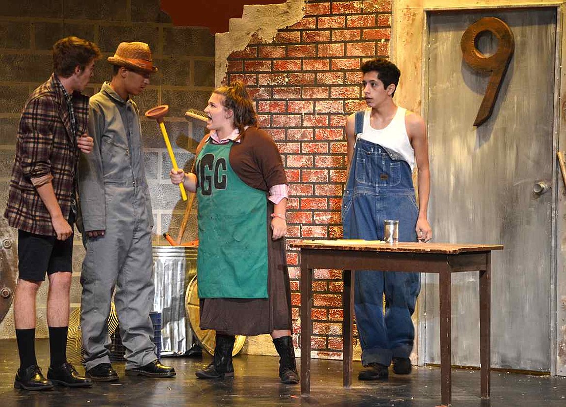 Plunger in hand, Penelope Pennywise informs "Old Man" Strong that he, like everyone else, has to pay in order to pee in the Port Chester Council for the Arts' summer production of Urinetown. From left: Henry Titcomb of Sleepy Hollow, Kyle Morales of Ardsley, Cassidy Donohue of Harrison and Troy Tripicchio of Harrison.    