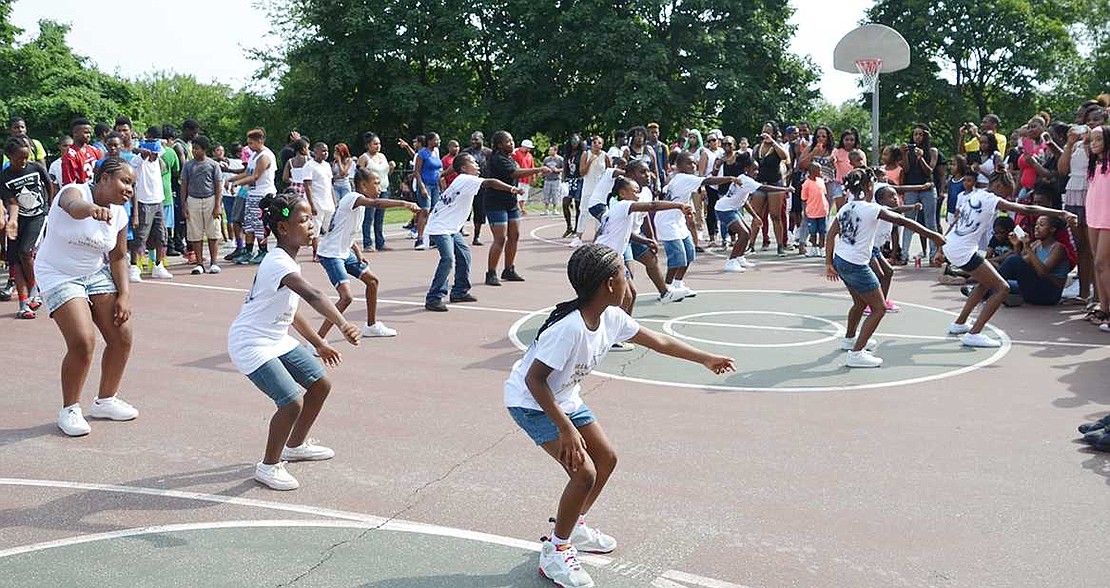 Members of the Little Weber Steppers perform a routine for family and neighbors during the Unity Day festivities. 