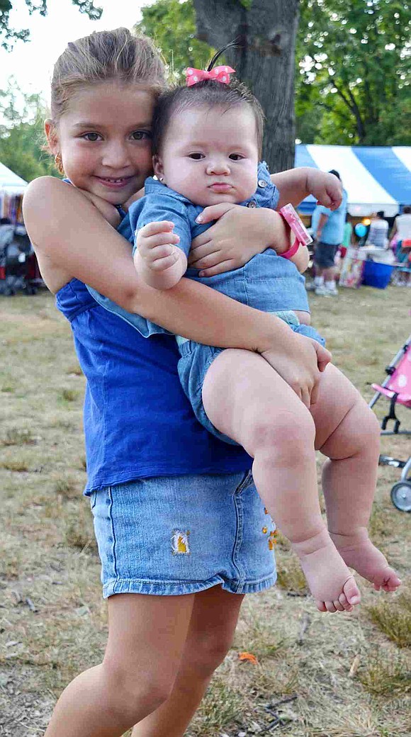  Natalie Bolanos, a Port Chester 6-year-old, holds her little cousin, Sophia Duran, a Port Chester 6-month-old.