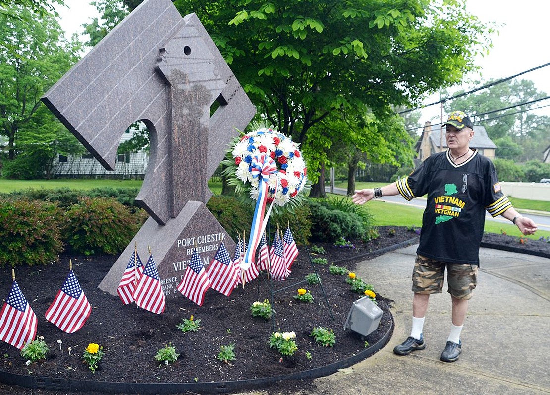 <p class="Picture">Tom Giorgi, wearing a shirt that reads &ldquo;All gave some and some gave all,&rdquo; speaks about the meaning of Memorial Day at the Vietnam War memorial. &ldquo;Never forget the people that keep us free,&rdquo; he said.</p>