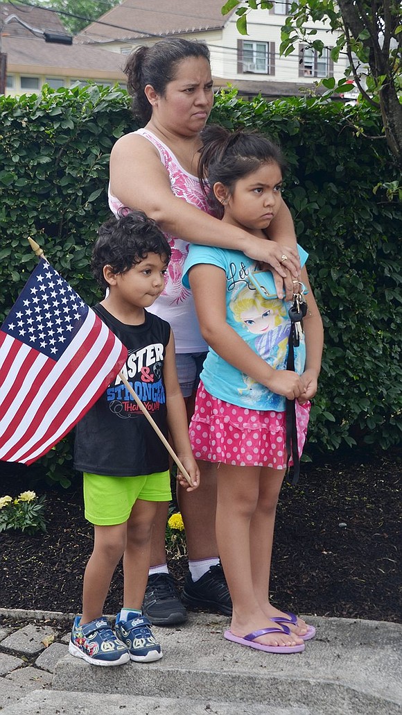 <p class="Picture">Despite the parade being cancelled due to threatening weather, Nancy Arroyo of 411 Westchester Ave. brought her children Lyndsay, 7, and Johan, 5, to the main Memorial Day observance at Veterans&rsquo; Memorial Park.</p>