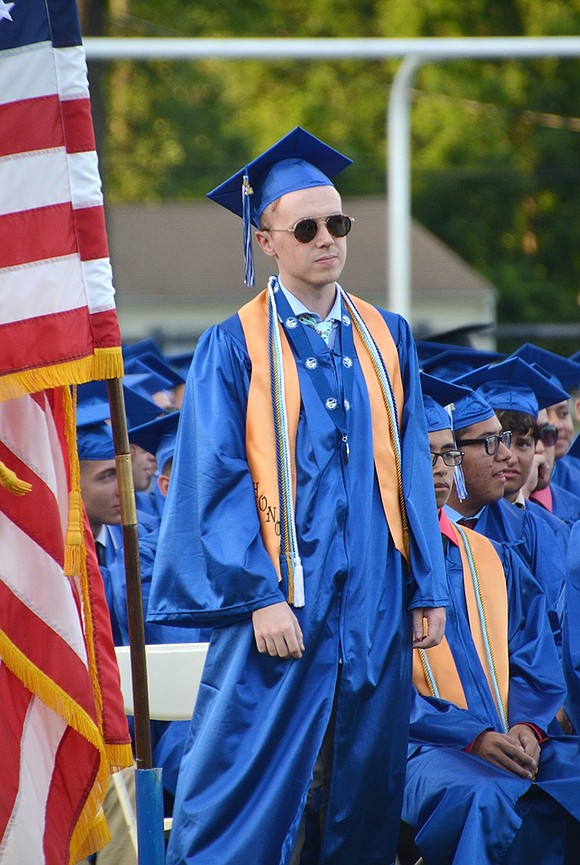 <span style="font-family: Arial, sans-serif;">Charlie Simmons rises when his name is called to accept his diploma. </span>Richard Abel|Westmore News<span style="font-family: Arial, sans-serif;"><br /> </span>